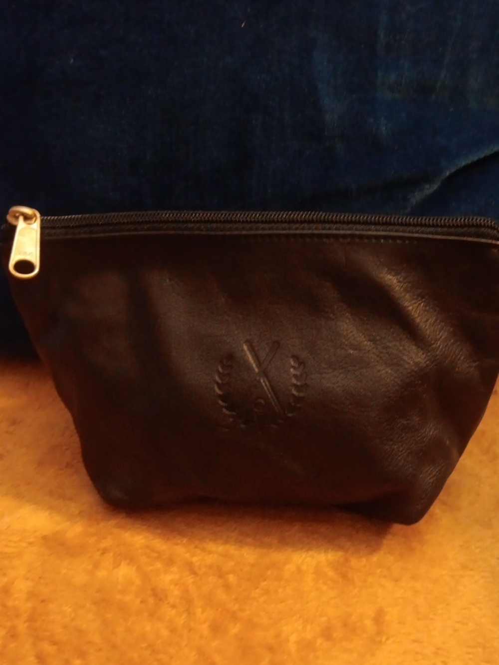 Classic Black Leather Toiletry Bag with Subtle Embossed Crest